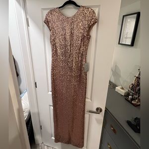 Stunning sequin floor length gown, never worn- tags attached